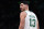 Boston Celtics center Enes Kanter Freedom looks toward the team's bench during the first half of an NBA basketball game Wednesday, Dec. 1, 2021, in Boston. The Boston Celtics center changed his name from Enes Kanter to Enes Kanter Freedom in celebration of him officially becoming a United States citizen Monday. (AP Photo/Charles Krupa)