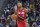 Portland Trail Blazers guard Damian Lillard (0) dribbles upcourt against the Golden State Warriors during the first half of an NBA basketball game in San Francisco, Friday, Nov. 26, 2021. (AP Photo/Jeff Chiu)