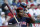Cleveland Indians' Yasiel Puig waits for an at-bat during the first inning of a baseball game against the Los Angeles Angels Wednesday, Sept. 11, 2019, in Anaheim, Calif. (AP Photo/Marcio Jose Sanchez)