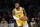 Los Angeles Lakers forward LeBron James (6) dribbles against the Sacramento Kings during the first half of an NBA basketball game in Los Angeles, Friday, Nov. 26, 2021. (AP Photo/Ringo H.W. Chiu)