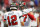 ATLANTA, GEORGIA - DECEMBER 05: Tom Brady #12 and Rob Gronkowski #87 of the Tampa Bay Buccaneers talk during pregame warm-ups prior to the game against the Atlanta Falcons at Mercedes-Benz Stadium on December 05, 2021 in Atlanta, Georgia. (Photo by Kevin C. Cox/Getty Images)