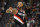 SALT LAKE CITY, UTAH - NOVEMBER 29: Damian Lillard #0 of the Portland Trail Blazers motions on the court in the second half during a game against the Utah Jazz at Vivint Smart Home Arena on November 29, 2021 in Salt Lake City, Utah. NOTE TO USER: User expressly acknowledges and agrees that, by downloading and or using this photograph, User is consenting to the terms and conditions of the Getty Images License Agreement.  (Photo by Alex Goodlett/Getty Images)