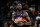 Phoenix Suns' Deandre Ayton runs up the court during the second half of an NBA basketball game against the San Antonio Spurs, Monday, Nov. 22, 2021, in San Antonio. Phoenix won 115-111. (AP Photo/Darren Abate)