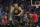 Golden State Warriors guard Stephen Curry (30) reacts after shooting against the Portland Trail Blazers during an NBA basketball game in San Francisco, Wednesday, Dec. 8, 2021. (AP Photo/Jeff Chiu)