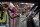 Brooklyn Nets forward Kevin Durant (7) makes his way past fans as he walks to the locker room after the Nets defeated the Atlanta Hawks in an NBA basketball game Friday, Dec. 10, 2021, in Atlanta. (AP Photo/John Bazemore)