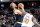 INDIANAPOLIS, INDIANA - DECEMBER 08:  Domantas Sabonis #11 of the Indiana Pacers shoots the ball while defended by Julius Randle #30 of the  New York Knicks at Gainbridge Fieldhouse on December 08, 2021 in Indianapolis, Indiana.     NOTE TO USER: User expressly acknowledges and agrees that, by downloading and or using this Photograph, user is consenting to the terms and conditions of the Getty Images License Agreement.  (Photo by Andy Lyons/Getty Images)