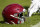 Washington Football Team helmet sits on the field prior to an NFL football game between the Kansas City Chiefs and the Washington Football Team, Sunday, Oct. 17, 2021, in Landover, Md. (AP Photo/Mark Tenally)