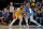 MEMPHIS, TENNESSEE - DECEMBER 09: Anthony Davis #3 of the Los Angeles Lakers handles the ball against Jaren Jackson Jr. #13 of the Memphis Grizzlies during the second half at FedExForum on December 09, 2021 in Memphis, Tennessee. NOTE TO USER: User expressly acknowledges and agrees that , by downloading and or using this photograph, User is consenting to the terms and conditions of the Getty Images License Agreement.  (Photo by Justin Ford/Getty Images)