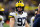 INDIANAPOLIS, IN - DECEMBER 04: Michigan Wolverines defensive end Aidan Hutchinson (97) walks on the sidelines during the Big 10 Championship game between the Michigan Wolverines and Iowa Hawkeyes on December 4, 2021, at Lucas Oil Stadium in Indianapolis, IN. (Photo by Zach Bolinger/Icon Sportswire via Getty Images)