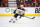 CALGARY, AB - DECEMBER 11: Boston Bruins Left Wing Brad Marchand (63) skates during the first period of an NHL game where the Calgary Flames hosted the Boston Bruins on December 11, 2021, at the Scotiabank Saddledome in Calgary, AB. (Photo by Brett Holmes/Icon Sportswire via Getty Images)