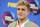 FILE - Internet personality Jake Paul arrives at the Teen Choice Awards in Los Angeles on Aug. 13, 2017. FBI agents including a SWAT team have raided the apparent home of YouTube star Jake Paul. FBI spokeswoman Laura Eimiller says agents executed a search warrant Wednesday at the Calabasas, California mansion in connection with an ongoing investigation. She could not say what the probe is about or who the target was. Helicopter video from local TV news showed agents gathering guns from the home that can frequently be seen on Paul's YouTube channel, which has over 20 million followers. (Photo by Jordan Strauss/Invision/AP, File)