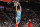 PORTLAND, OREGON - DECEMBER 17: LaMelo Ball # 2 of the Charlotte Hornets dunks the ball past Norman Powell # 24 of the Portland Trail Blazers during the second half against the Portland Trail Blazers at Moda Center on December 17, 2021 in Portland, Oregon. NOTE TO USER: User expressly acknowledges and agrees that, by downloading and or using this photograph, User is consenting to the terms and conditions of the Getty Images License Agreement. (Photo by Soobum Im/Getty Images)