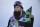Chloe Kim, of the United States, holds the first place finish following the snowboarding halfpipe finals, Sunday, Dec. 19, 2021, during Dew Tour at Copper Mountain, Colo. (AP Photo/Hugh Carey)