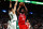 BOSTON, MASSACHUSETTS - DECEMBER 20: Joel Embiid #21 of the Philadelphia 76ers drives to the basket on Enes Freedom #13 of the Boston Celtics during the first quarter of the game against the Boston Celtics at TD Garden on December 20, 2021 in Boston, Massachusetts.NOTE TO USER: User expressly acknowledges and agrees that, by downloading and or using this photograph, User is consenting to the terms and conditions of the Getty Images License Agreement.  (Photo by Omar Rawlings/Getty Images)