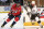 FILE - At left, in a Sept. 29, 2021, file photo, Washington Capitals left wing Alex Ovechkin (8) skates during the first period of an NHL preseason hockey game against the New Jersey Devils in Washington. At right, in a Saturday, Jan. 27, 1996, file photo, Los Angeles Kings' Wayne Gretzky passes during an NHL hockey game against the Mighty Ducks of Anaheim, in Inglewood, Calif. Alex Ovechkin starts a new five-year contract ready to chase Wayne Gretzky's career goals record that long seemed unbreakable. The Washington Capitals captain has 730 goals and needs 165 to pass Gretzky. (AP Photo/File)