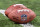 INDIANAPOLIS, IN - DECEMBER 18: An NFL logo is seen on the side of a football before the NFL football game between the New England Patriots and the Indianapolis Colts on December 18, 2021, at Lucas Oil Stadium in Indianapolis, Indiana. (Photo by Michael Allio/Icon Sportswire via Getty Images)