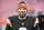FILE - Cleveland Browns quarterback Baker Mayfield walks off the field after his team defeated the Baltimore Ravens in an NFL football game, Sunday, Dec. 12, 2021, in Cleveland. Mayfield and coach Kevin Stefanski tested positive for COVID-19 on Wednesday, Dec. 15, and will likely miss Saturday’s game against the Las Vegas Raiders as Cleveland deals with a widespread outbreak during its playoff pursuit.(AP Photo/David Richard, File)
