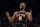 New York Knicks guard Kemba Walker reacts against the Atlanta Hawks during the second half of an NBA basketball game Saturday, Dec. 25, 2021, in New York. The Knicks won 101-87. (AP Photo/Adam Hunger)