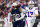 FOXBOROUGH, MASSACHUSETTS - DECEMBER 26: Josh Allen #17 of the Buffalo Bills looks to throw the ball as Christian Barmore #90 of the New England Patriots applies pressure during the first quarter at Gillette Stadium on December 26, 2021 in Foxborough, Massachusetts. (Photo by Maddie Malhotra/Getty Images)