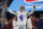 Dallas Cowboys quarterback Dak Prescott (4) cheers on his team during warm ups before the first half of an NFL football game against the Washington Football Team in Arlington, Texas, Sunday, Dec. 26, 2021. (AP Photo/Ron Jenkins)