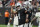 Las Vegas Raiders quarterback Derek Carr (4) motions against the Denver Broncos during the second half of an NFL football game, Sunday, Dec. 26, 2021, in Las Vegas. (AP Photo/Rick Scuteri)a
