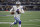 Dallas Cowboys quarterback Dak Prescott runs with the ball during the first half of an NFL football game against the Washington Football Team in Arlington, Texas, Sunday, Dec. 26, 2021. (AP Photo/Roger Steinman)