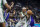 Dallas Mavericks guard Isaiah Thomas (2) passes the ball to a teammate during the first quarter of an NBA basketball game in Sacramento, Calif., Wednesday, Dec. 29, 2021. (AP Photo/José Luis Villegas)