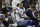 Dallas Cowboys quarterback Dak Prescott (4) throws a drink cup away during the first half of an NFL football game against the Washington Football Team in Arlington, Texas, Sunday, Dec. 26, 2021. (AP Photo/Roger Steinman)