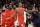 Chicago Bulls forward DeMar DeRozan (11) reacts with teammates after he made a three-point basket at the buzzer at the end of an NBA basketball game against the Washington Wizards, Saturday, Jan. 1, 2022, in Washington. The Bulls won 120-119. (AP Photo/Nick Wass)
