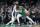 Boston Celtics guard Jaylen Brown (7) drives against Orlando Magic guard Hassani Gravett (12) during the first half of an NBA basketball game, Sunday, Jan. 2, 2022, in Boston. (AP Photo/Mary Schwalm)