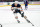 ELMONT, NEW YORK - JANUARY 01: Connor McDavid #97 of the Edmonton Oilers plays the puck against the New York Islanders at UBS Arena on January 01, 2022 in Elmont, New York. (Photo by Michelle Farsi/NHLI via Getty Images)