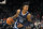 Memphis Grizzlies guard Ja Morant (12) during the first half of an NBA basketball game against the Phoenix Suns, Monday, Dec. 27, 2021, in Phoenix. (AP Photo/Rick Scuteri)