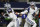 ARLINGTON, TEXAS - JANUARY 02: Dak Prescott #4 of the Dallas Cowboys hands the ball to Ezekiel Elliott #21 during the second quarter against the Arizona Cardinals at AT&T Stadium on January 02, 2022 in Arlington, Texas. (Photo by Richard Rodriguez/Getty Images)