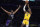 Los Angeles Lakers forward LeBron James (6) shoots over Sacramento Kings forward Maurice Harkless (8) during the first half of an NBA basketball game Tuesday, Jan. 4, 2022, in Los Angeles. (AP Photo/Marcio Jose Sanchez)