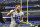 Los Angeles Rams wide receiver Cooper Kupp (10) jogs off the field after an NFL football game against the Baltimore Ravens, Sunday, Jan. 2, 2022, in Baltimore. (AP Photo/Terrance Williams)