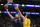 Dallas Mavericks guard Luka Doncic (77) shoots against Golden State Warriors forward Nemanja Bjelica (8) during the first quarter of an NBA basketball game in Dallas, Wednesday, Jan. 5, 2022. (AP Photo/LM Otero)