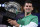 FILE - Serbia's Novak Djokovic holds the Norman Brookes Challenge Cup after defeating Russia's Daniil Medvedev in the men's singles final at the Australian Open tennis championship in Melbourne, Australia, Sunday, Feb. 21, 2021. Djokovic has had his visa canceled and been denied entry to Australia, Thursday, Jan. 6, 2022 and is set to be removed from the country after spending the night at the Melbourne airport as officials refused to let him enter the country for the Australian Open after an apparent visa mix-up.(AP Photo/Andy Brownbill, File)
