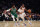 NEW YORK, NEW YORK - JANUARY 06:  RJ Barrett #9 of the New York Knicks drives against Marcus Smart #36 of the Boston Celtics during their game at Madison Square Garden on January 06, 2022 in New York City.  NOTE TO USER: User expressly acknowledges and agrees that, by downloading and or using this photograph, User is consenting to the terms and conditions of the Getty Images License Agreement. (Photo by Al Bello/Getty Images)
