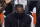 FILE - Los Angeles Clippers forward Kawhi Leonard sits on the bench during the first half in Game 6 of the NBA basketball Western Conference Finals against the Phoenix Suns in Los Angeles, in this Wednesday, June 30, 2021, file photo. The biggest question hanging over the Clippers is when Leonard will return. Will he work his way back from knee surgery to repair a partially torn ACL before the end of the regular season? Or for the playoffs? Or remain out until next season?Even he isn't sure. (AP Photo/Mark J. Terrill, File)