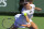 FILE - Renata Voracova of the Czech Republic returns a shot to Shuai Peng of China during a first round match at the BNP Paribas Open tennis tournament in Indian Wells, Calif., on March 10, 2011. The Australian Broadcasting Corp. reported later Friday, Jan. 7, 2022, that Voracova, a 38-year-old doubles player from the Czech Republic, had her visa canceled and was taken to the same hotel where Novak Djokovic is staying. (AP Photo/Darron Cummings, File)