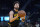 Golden State Warriors guard Klay Thompson warms up before an NBA basketball game against the Miami Heat in San Francisco, Monday, Jan. 3, 2022. (AP Photo/Jeff Chiu)