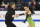 Madison Chock and Evan Bates compete in the rhythm dance program during the U.S. Figure Skating Championships Friday, Jan. 7, 2022, in Nashville, Tenn. (AP Photo/Mark Zaleski)