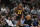 Atlanta Hawks' Cam Reddish runs up the court during the first half of an NBA basketball game against the San Antonio Spurs, Wednesday, Nov. 24, 2021, in San Antonio. Atlanta won 124-106. (AP Photo/Darren Abate)