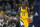 Indiana Pacers' Caris LeVert dribbles during the first half of an NBA basketball game against the Chicago Bulls, Friday, Dec. 31, 2021, in Indianapolis. (AP Photo/Darron Cummings)