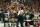 INDIANAPOLIS, IN - JANUARY 10: Georgia Bulldogs head coach Kirby Smart holds the national championship trophy after the Alabama Crimson Tide versus the Georgia Bulldogs in the College Football Playoff National Championship, on January 10, 2022, at Lucas Oil Stadium in Indianapolis, IN. (Photo by Zach Bolinger/Icon Sportswire via Getty Images)