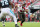 TAMPA, FL - JANUARY 9: Tampa Bay Buccaneers Defensive End Ndamukong Suh (93) rushes the passer during the regular season game between the Carolina Panthers and the Tampa Bay Buccaneers on January 9, 2022 at Raymond James Stadium in Tampa, Florida. (Photo by Cliff Welch/Icon Sportswire via Getty Images)