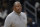 Georgetown head coach Patrick Ewing reacts during the first half of an NCAA college basketball game against Syracuse, Saturday, Dec. 11, 2021, in Washington. (AP Photo/Nick Wass)