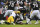 Pittsburgh Steelers outside linebacker T.J. Watt sacks Baltimore Ravens quarterback Tyler Huntley (2) and forces a fumble during the first quarter of an NFL football game, Sunday, Jan. 9, 2022, in Baltimore. (AP Photo/Terrance Williams)