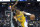 Los Angeles Lakers guard Russell Westbrook (0) tries to drive on Sacramento Kings guard Davion Mitchell, left, in the first quarter of an NBA basketball game in Sacramento, Calif., Wednesday, Jan. 12, 2022. (AP Photo/José Luis Villegas)