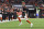 Cincinnati Bengals quarterback Joe Burrow (9) looks to pass in the first half during an NFL wild-card playoff football game against the Las Vegas Raiders, Saturday, Jan. 15, 2022, in Cincinnati. (AP Photo/Emilee Chinn)
